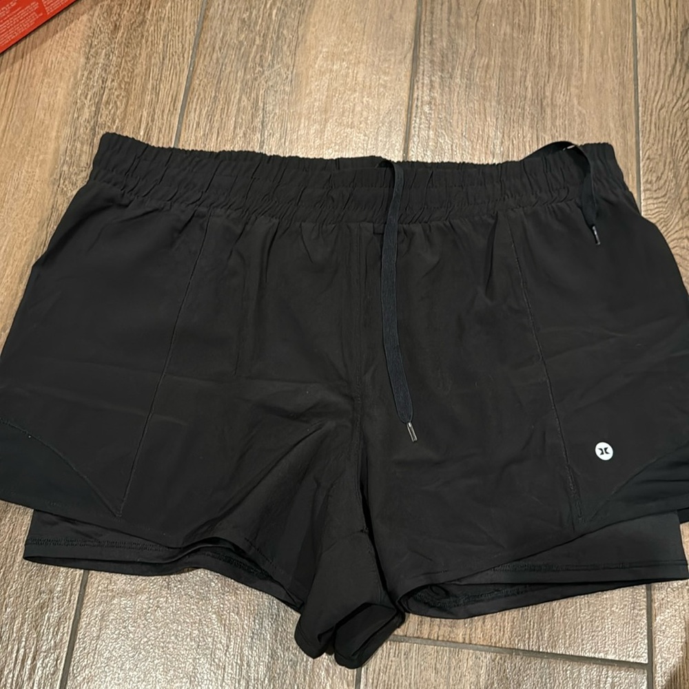Black exercise shorts with leggings